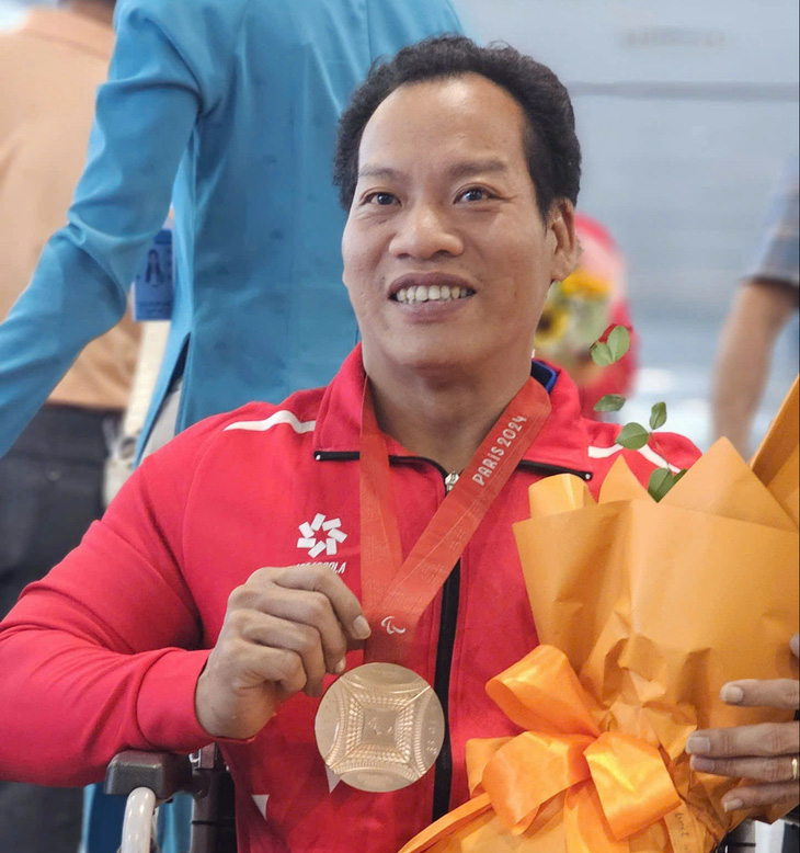 Đoàn thể thao người khuyết tật Việt Nam về nước sau khi hoàn thành mục tiêu Paralympic 2024 - Ảnh 2.